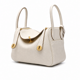 Maren Pebbled Leather Shoulder Bag in Ivory