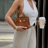 Sloane Pebbled Calfskin Top-Handle Bag in Caramel