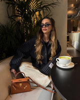 Sloane Pebbled Calfskin Top-Handle Bag in Caramel
