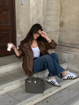 Sloane Pebbled Calfskin Top-Handle Bag in Taupe