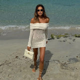 Sloane Pebbled Calfskin Top-Handle Bag in Ivory